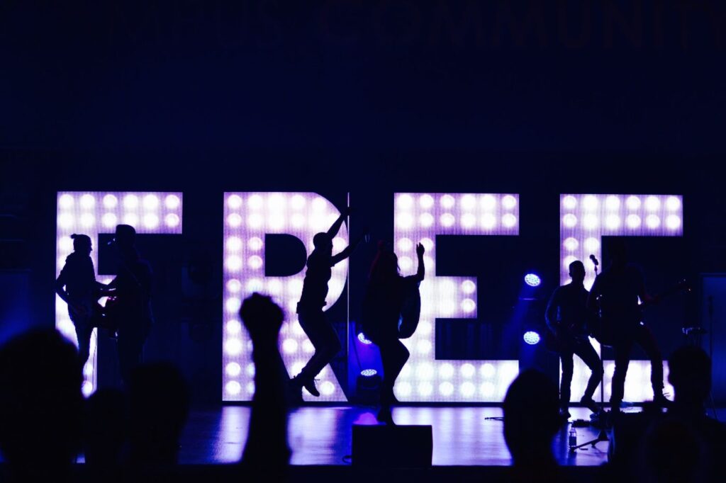 the word free and people dancing