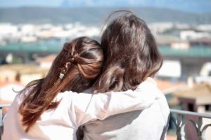 two women hugging